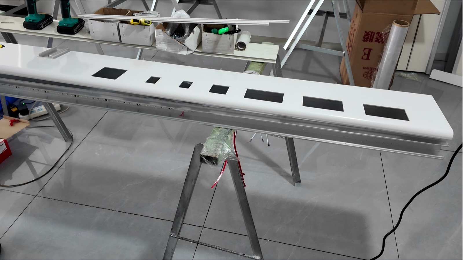 Front panel openings and the lighting channel during assembly.