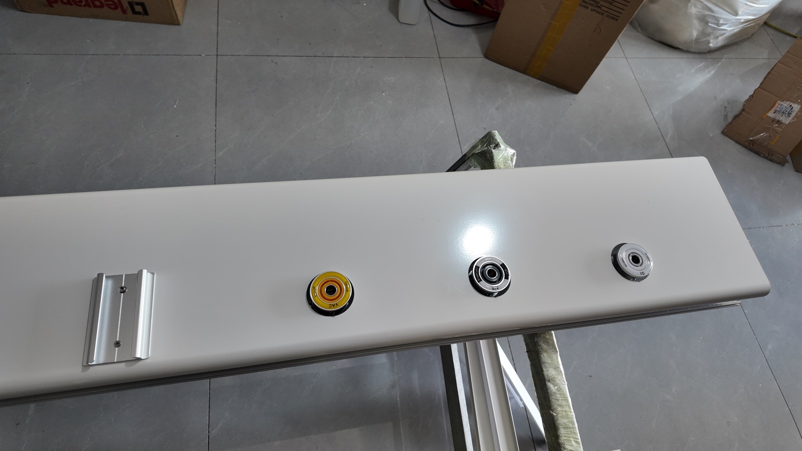 Gas terminals positioned through the front panel.
