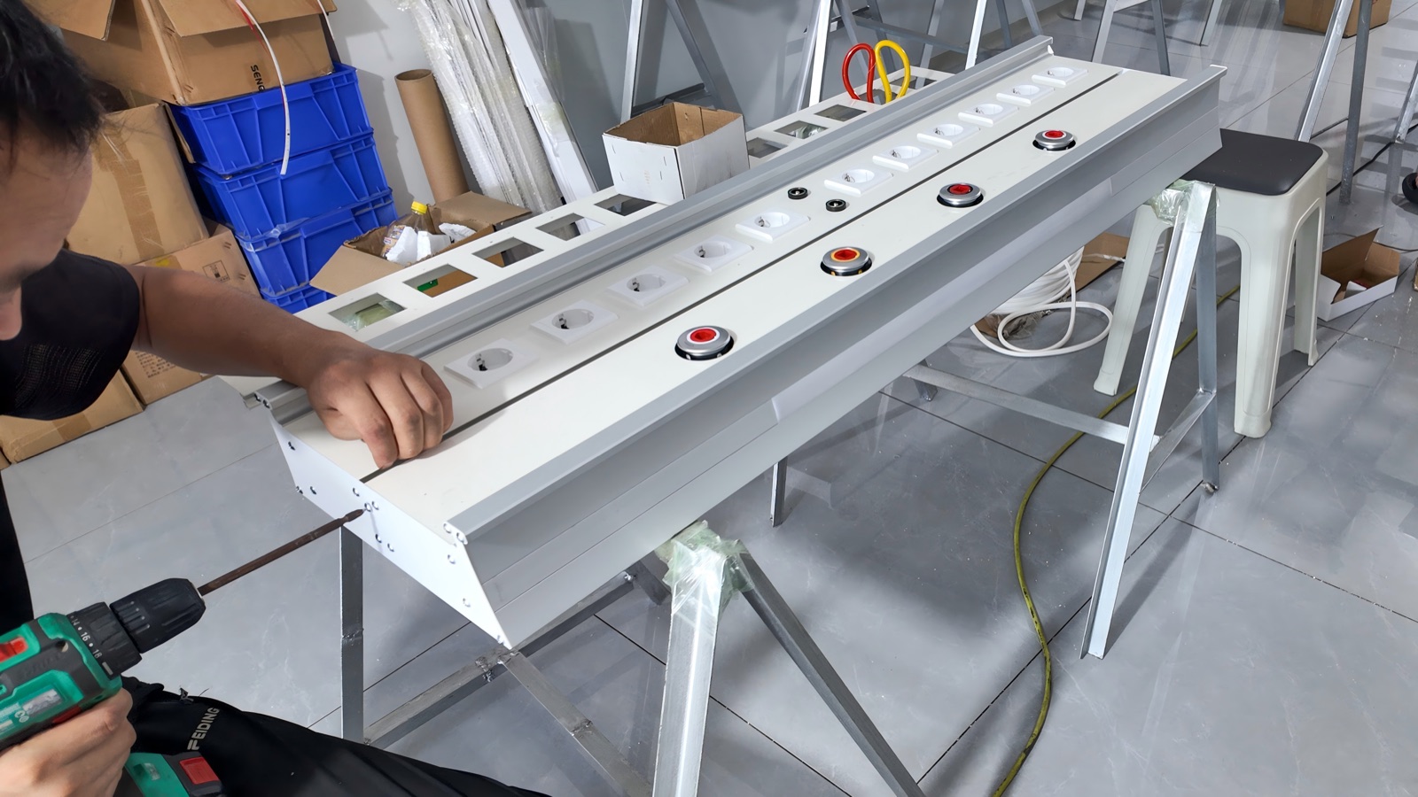 Securing a long panel section during assembly.