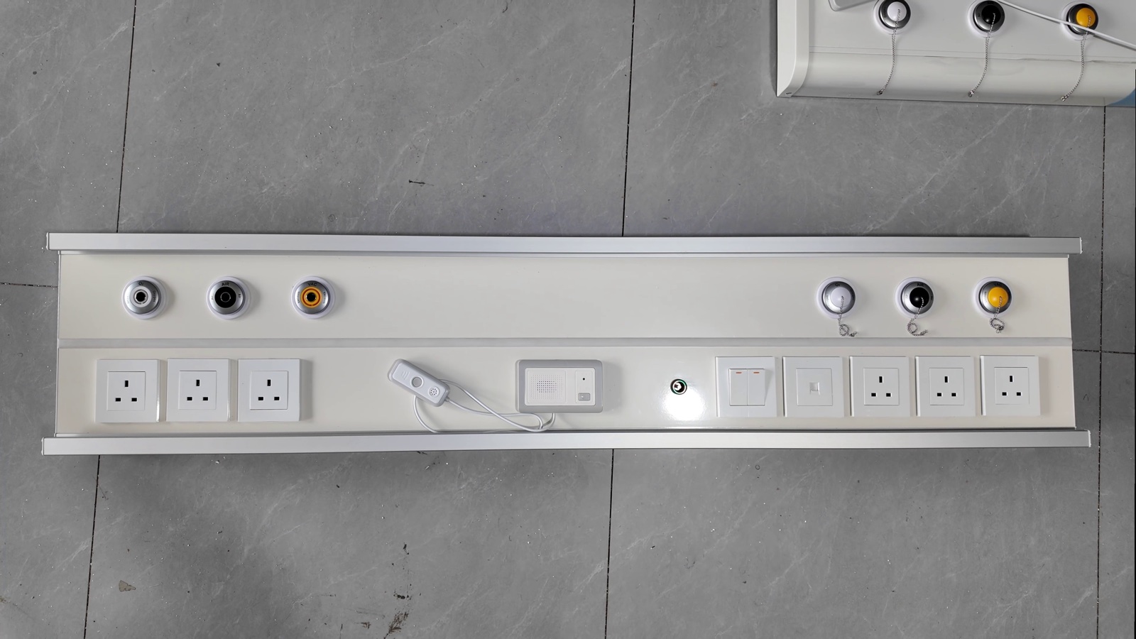 The completed panel, with the second unit of the batch alongside it.
