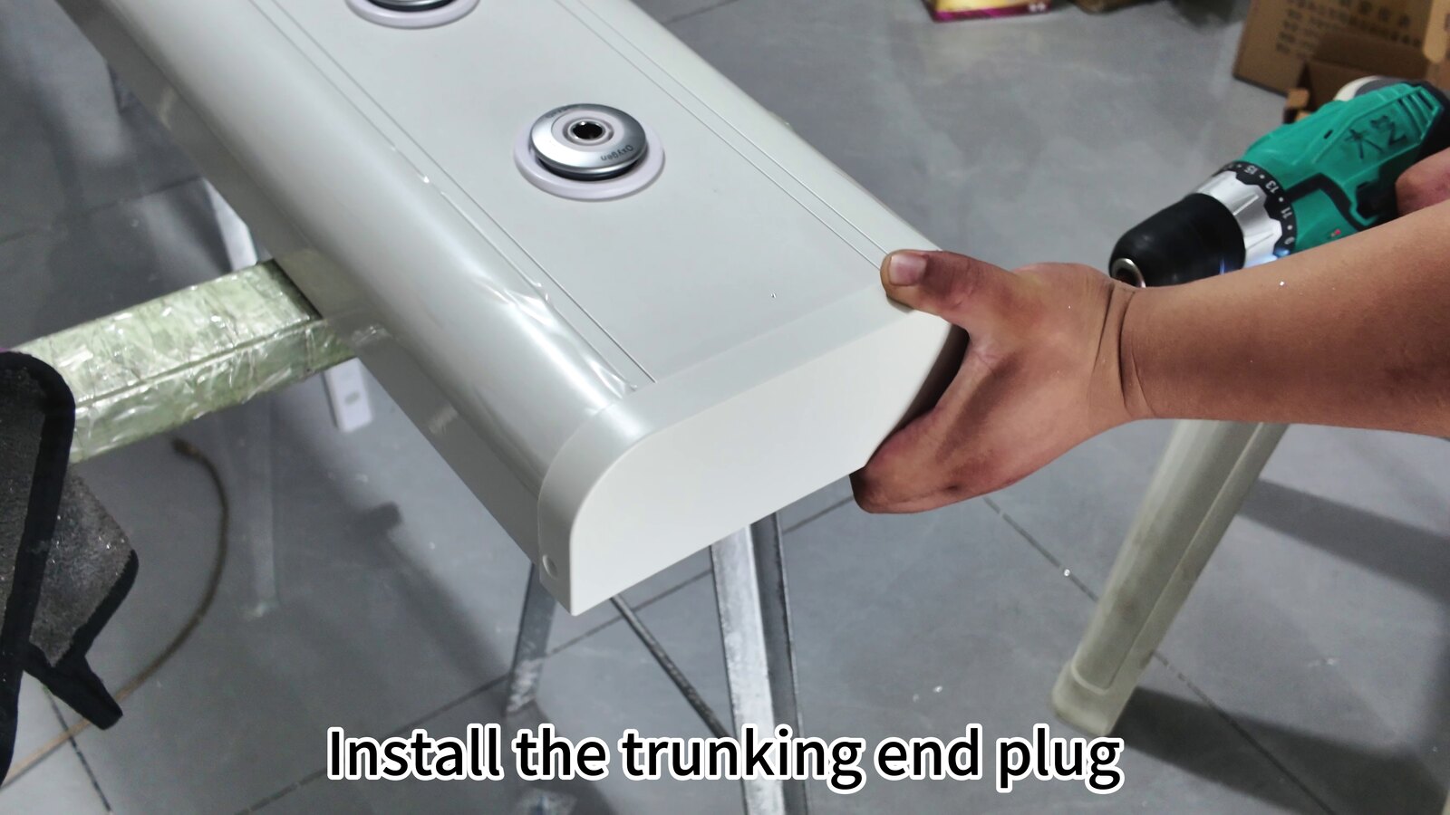 Fitting the trunking end cap to a BHU210-73 bed head unit