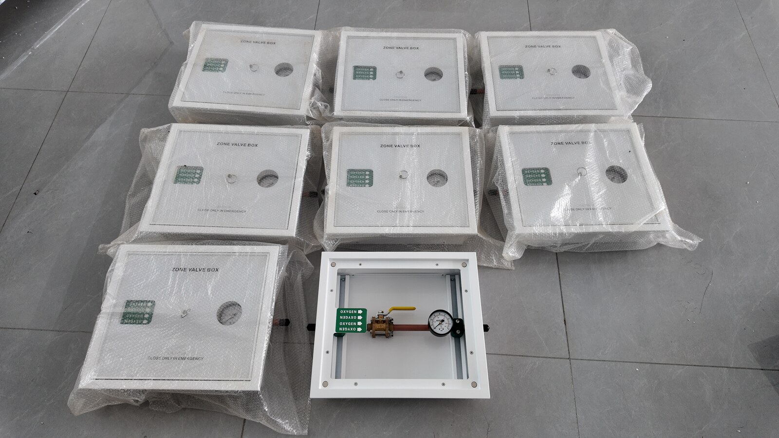 Eight GVB-4 zone valve boxes arranged together, one open