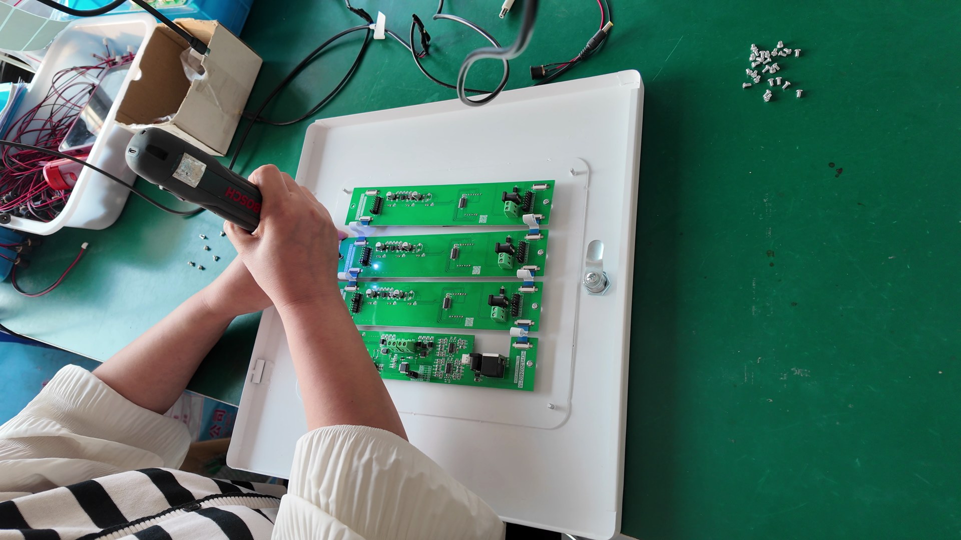 Mounting the alarm display boards behind the cabinet door